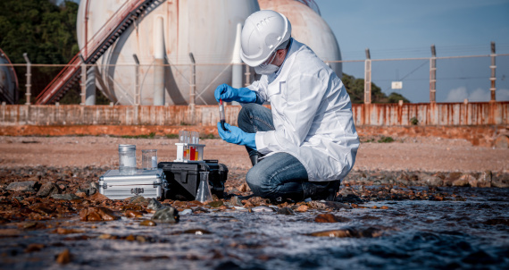 scientist-wearing-protective-uniform-and-glove-und-2025-03-13-19-24-12-utc